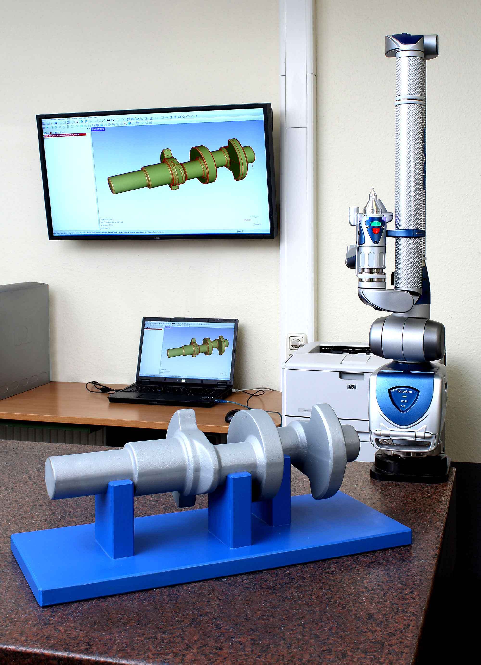 dimensional check-ISTR-optical measuring core-intensive iron castings made with spheroidal graphite with high nodularity are checked during First Article Inspection (FAI) in the department of quality assurance with a FARO-measuring device for size accuracy.