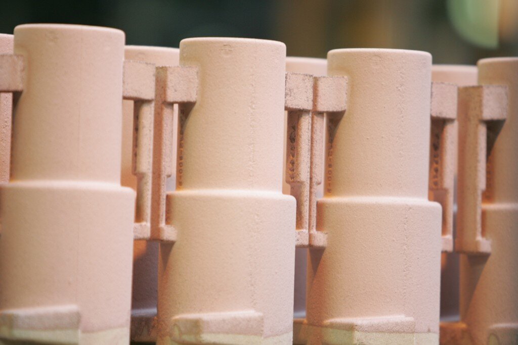 fitting-core-painting cores for valves and pipes are often painted with waterbased dressing, to obtain a lower surface roughness in the fluid area